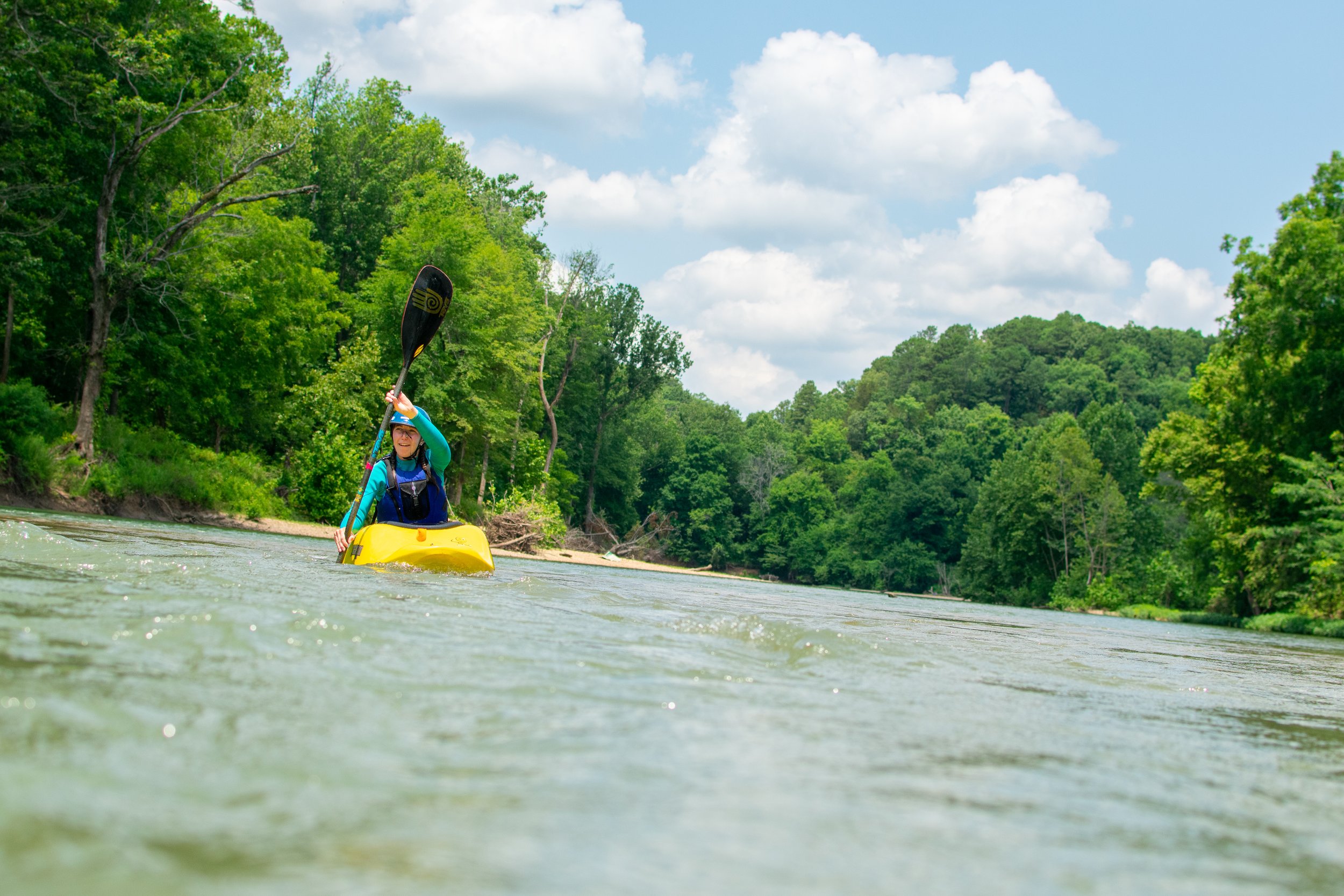 girl paddling kayak at kayak park 2021 (purchased).jpg